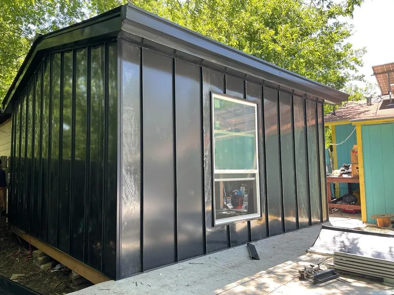 Black standing seam metal wall panels for Metal Roof Installation in Montrose