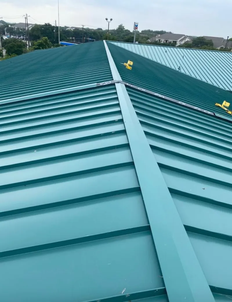 Green commercial metal roof ridge and valley for Metal Roof Repair in Montrose